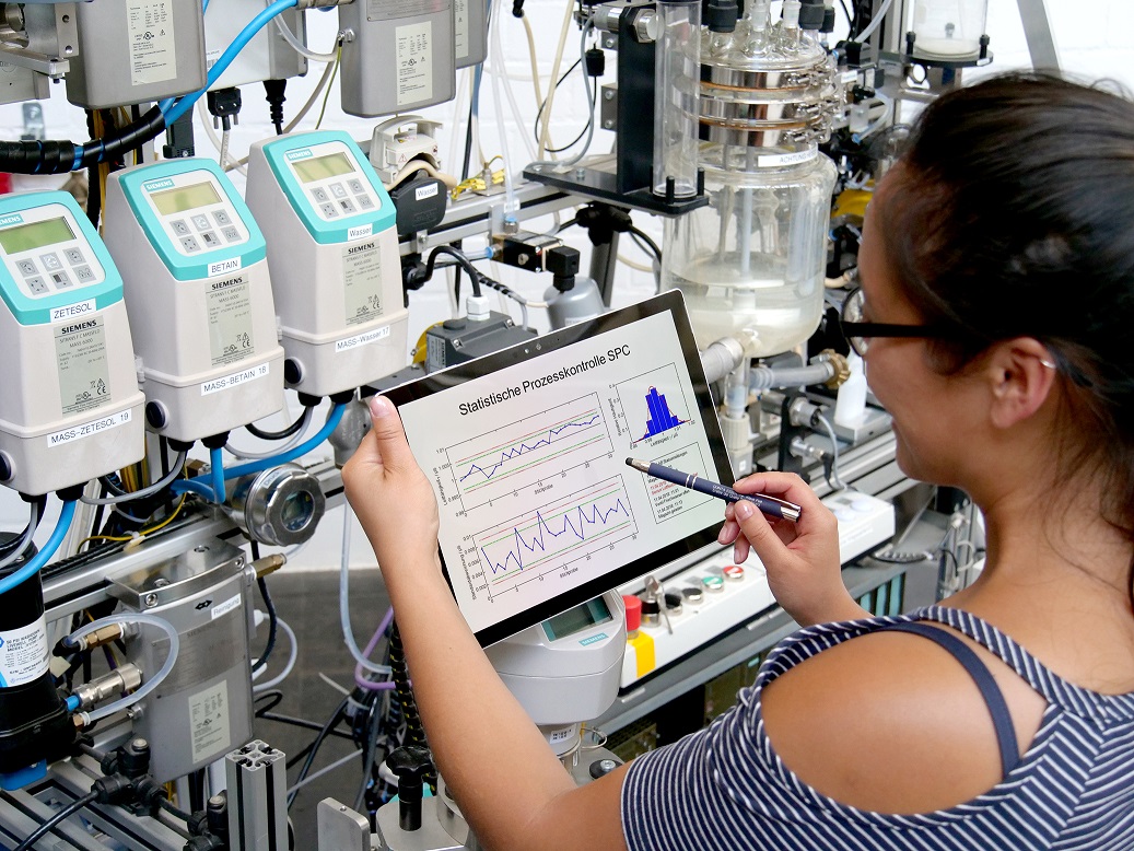 student operates the Cosmolab facility at the Lab for Automation Technology student operates the Cosmolab facility at the Lab for Automation Technology