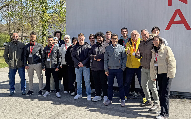 group of participants at HKA campus entrance