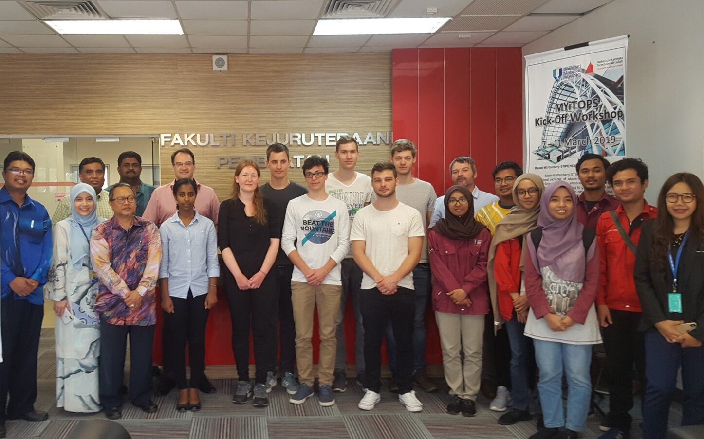 Students and lecturers of UMP and HKA in a conference room Students and lecturers of UMP and HKA in a conference room